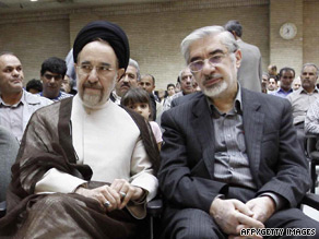 Opposition leaders Mir Hossein Moussavi (right) and ex-president Mohammad Khatami blasted the trials.