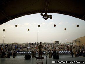 Troops at Camp Arifjan in Kuwait gather for a 2007 holiday show.