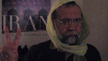 Men wear headscarves in protest