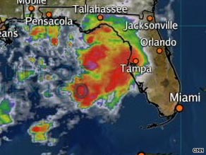 A satellite image from 2 p.m. ET Sunday shows a tropical storm nearing the Florida Panhandle.