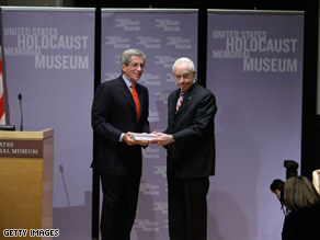 U.S. Attorney General Michael Mukasey (R) and Fred Zeidman (L), Chairman of U.S. Holocaust Memorial Museum, in Washington, DC. The Department of Justice has donated copies of its records against alleged Nazi war criminals living in the U.S.