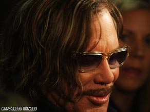 Mickey Rourke called in a favor from old buddy Axl Rose of Guns N Roses for the soundtrack of 'The Wrestler.'