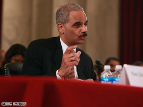 Attorney General designate Eric Holder discussed a federal wiretap law during his confirmation hearing Thursday.