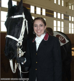 Nina Karas, a horseback rider from Culver Academies, prepares to ride in Tuesday's inaugural parade.