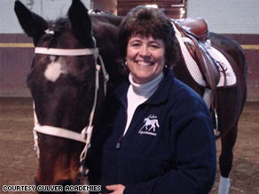Lynn Rasch, Assistant Dean of Girls, Culver Academies with one a horse, Otis, of Culver Academies.
