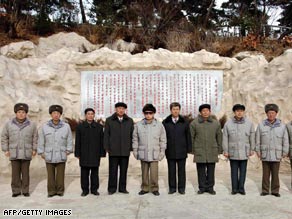 North Korean leader Kim Jong Il, center, in Pyongyang with members of the Workers' Party of Korea