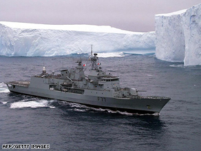 A New Zealand frigate patrols past the Ross Ice Shelf in the Southern Ocean in Antarctica.