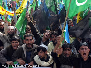 Tribesmen and activists of Pakistani Islamist party, Jamaat-i-Islami, shout during a demonstration in Islamabad on January 23, demanding an end to Pakistan military operations and US missile attacks against Taliban militants in lawless areas bordering Afghanistan.