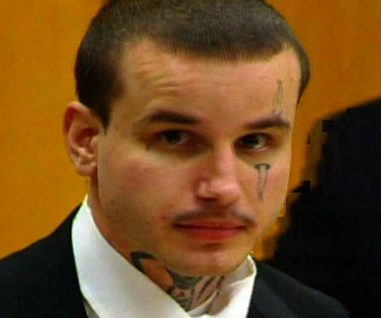 Neck Tattoo on Nancy Miller the tattoos on the defendant's face and neck 