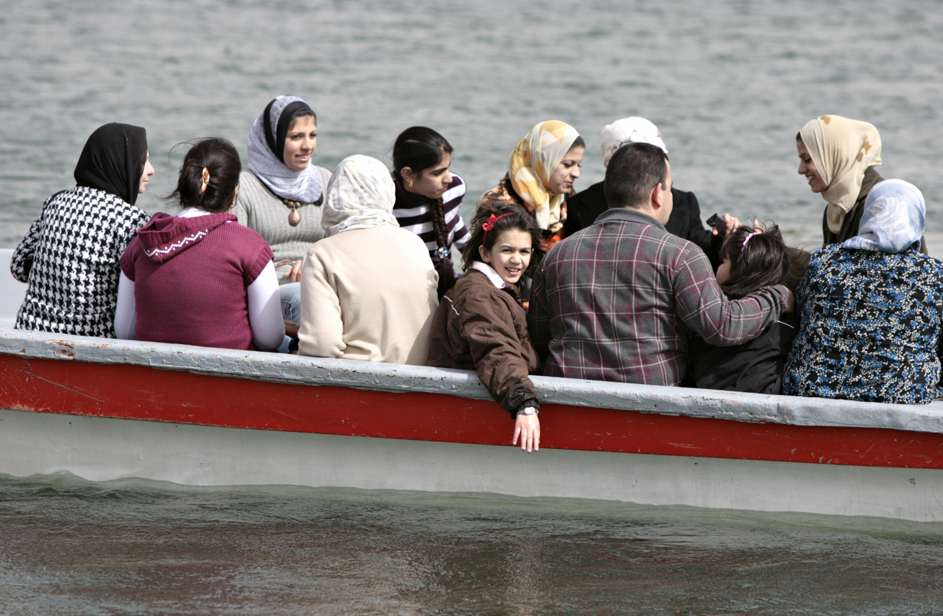 AHMAD AL-RUBAYE/AFP/Getty Images. While the weather is relatively cool at 20 degrees centigrade, hundreds of families and youth turn up every Friday to the park to enjoy tours on boats in the large pond.