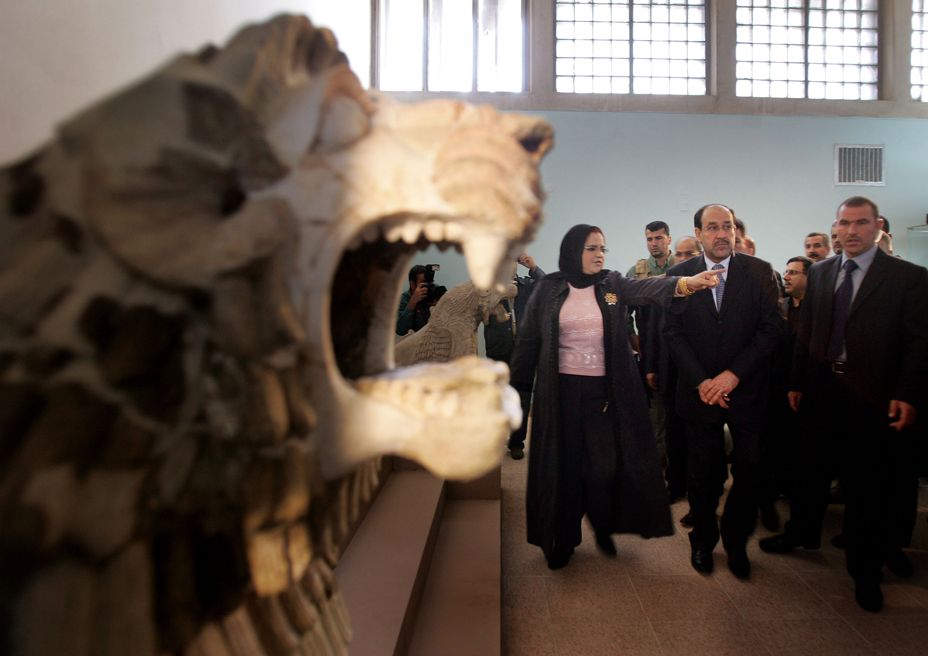 Wathiq Khuzaie/Getty Images. Iraqi National Museum director Amira Eidan (1st L) talks to Iraqi Prime Minister Nuri al-Maliki (2nd L) and other Iraqi officials during a tour at Iraq National Museum on February 23, 2009 in Baghdad, Iraq. The Museum was vandalized and looted during the chaos which followed the 2003 US-led invasion of the country.