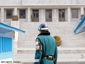  A South Korean soldier stands guard at Panmunjom in the demilitarized zone between the North and South.