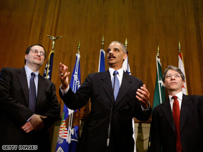 Large holes in the Obama administration were filled Friday as Attorney General Eric Holder personally swore in his new deputy attorney general and associate attorney general.