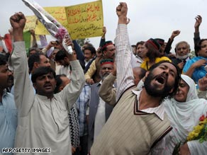 Pakistanis celebrate Sunday in Islamabad.