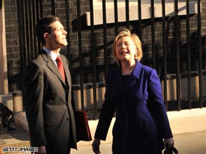 U.S. Secretary of State Hillary Clinton and British Foreign Minister David Miliband enjoy the sunshine outside Number 10.