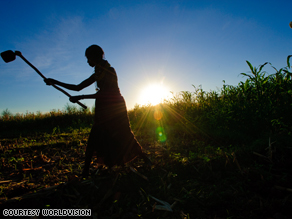 In Turkana, Kenya, a woman hoes the fields in preparation for planting. At the G-20 this week, President Obama promised to double U.S. aid for global agricultural development.