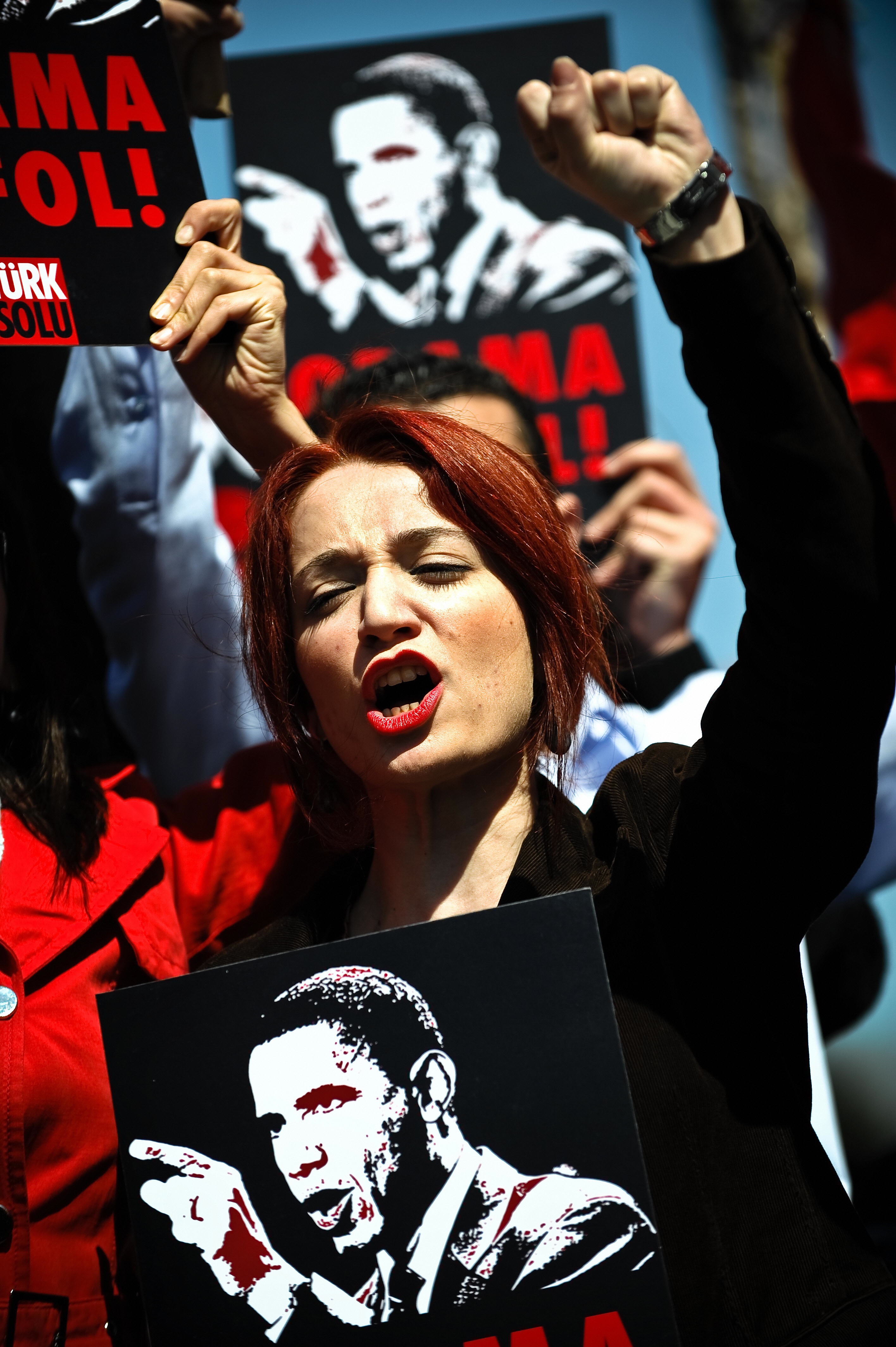 DIMITAR DILKOFF/AFP/Getty Images. A Turkish protestor shouts slogans and holds a banner reading 'Obama go home' during a demonstration against upcoming visit of US President Barack Obama in Istanbul on April 5, 2009.