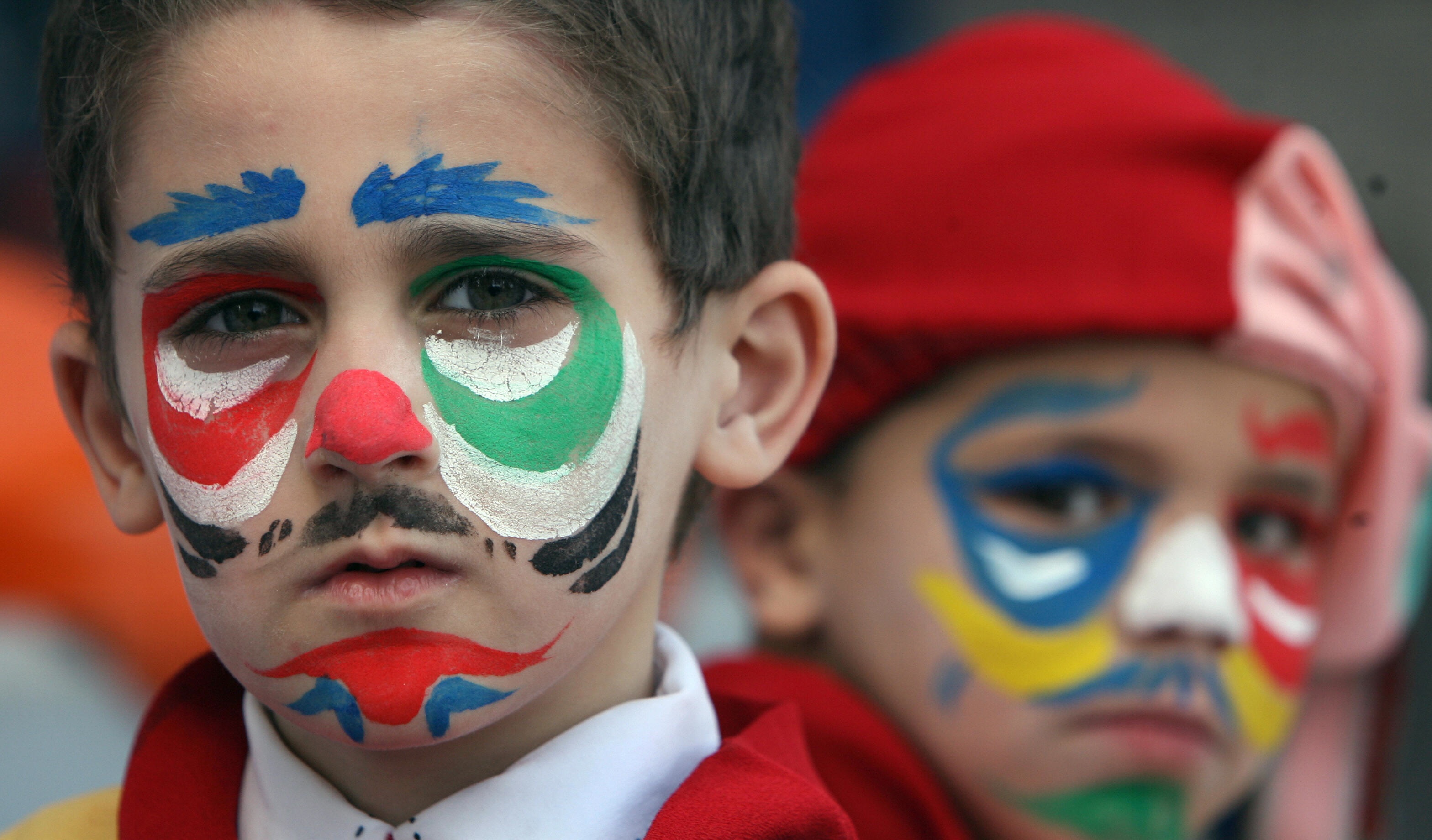 MAHMUD HAMS/AFP/Getty Images.Palestinian children attend a rally in Gaza City to mark the Palestinian children day on April 05, 2009.