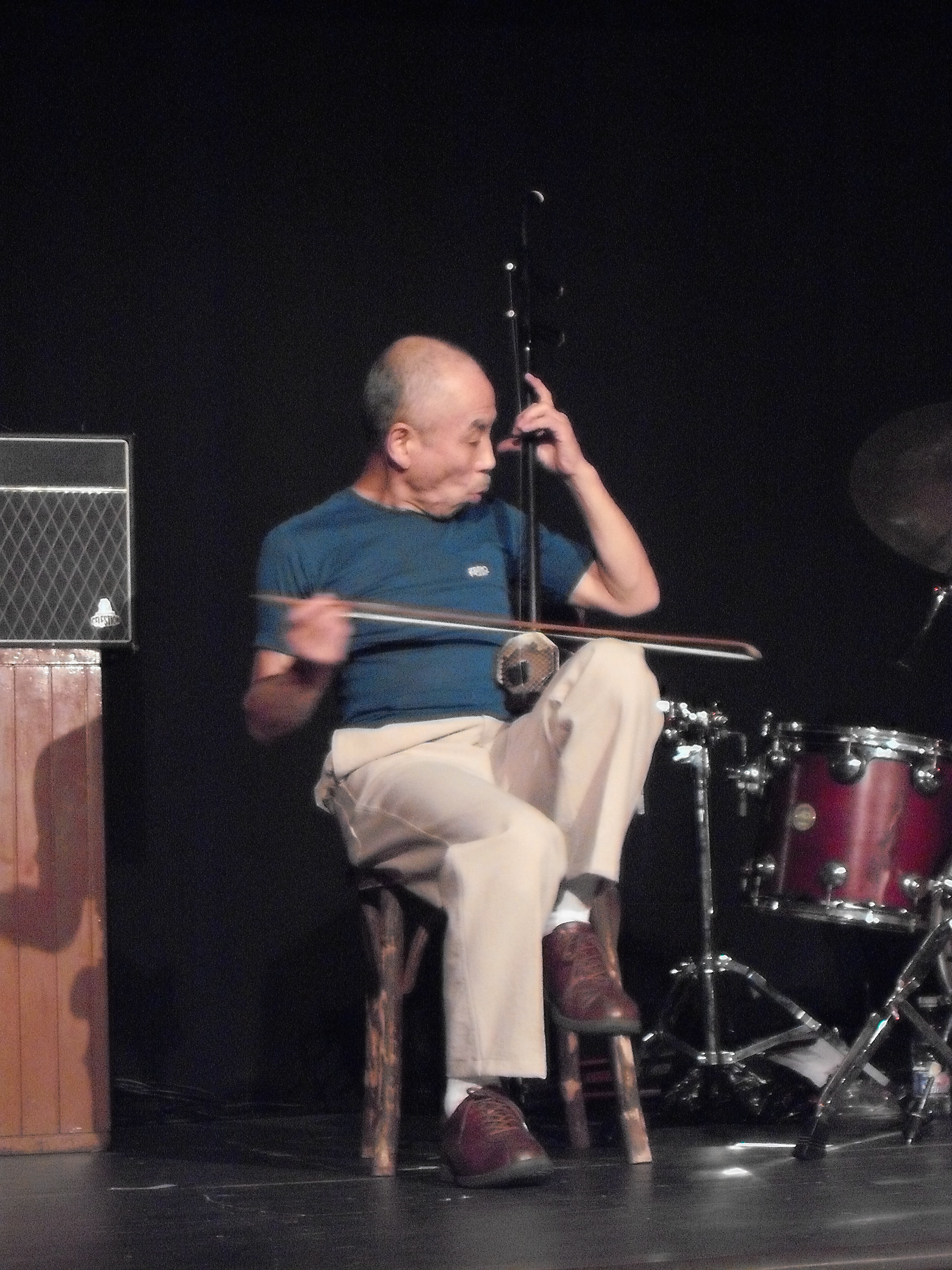 Sabu is not only one of the foremost Japanese free jazz drummers, he gives a dramatic performance on the Kokyo, a traditional Japanese 3-string instrument played with a bow