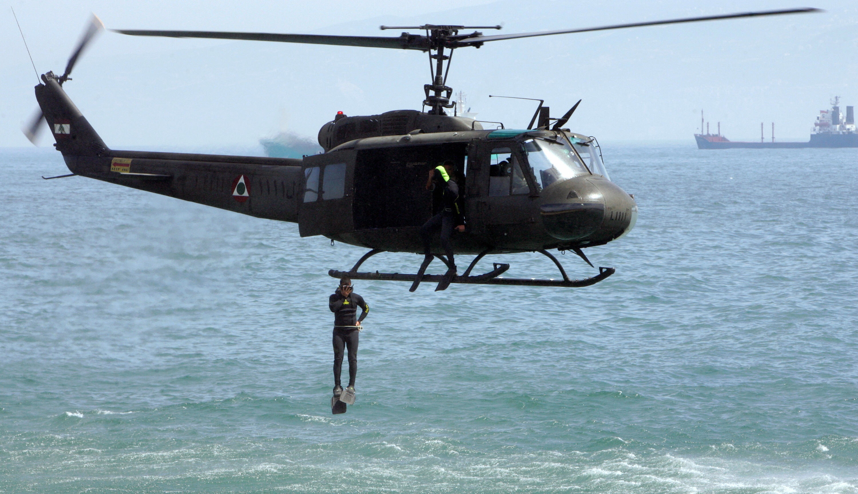 ANWAR AMRO/AFP/Getty Images. A member of the Lebanese Special Forces jumps off a military helicopter as he displays his combat skills at the opening ceremony of the Security Middle East show in Beirut on April 20, 2009.