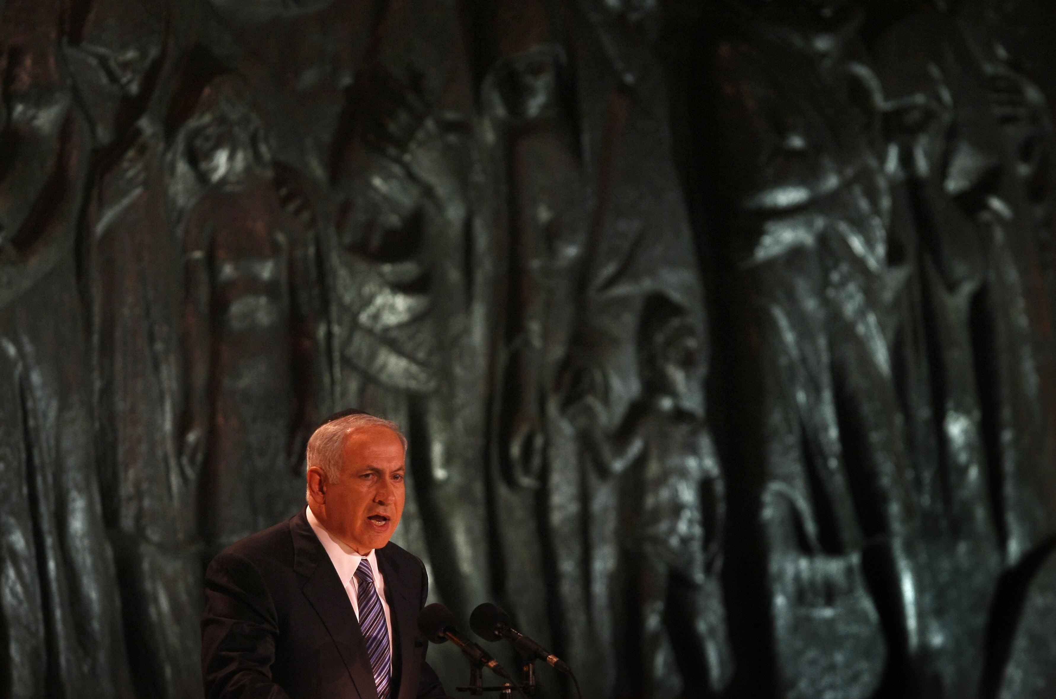 MENAHEM KAHANA/AFP/Getty Images. Israeli Prime Minister Benjamin Netanyahu speaks at the opening ceremony of the Holocaust Remembrance Day at the Yad Vashem Holocaust national memorial in Jerusalem, on April 20, 2009. Israel began marking Remembrance Day at sundown with a ceremony to the six million Jews killed by the Nazis during World War II. More than 230,000 Holocaust survivors currently live in Israel, according to estimates by advocacy groups.