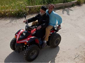 Buettner gets a ride on one of the All-Terrain-Vehicles popular in Ikaria given the steep terrain.