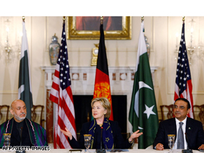 U.S. Secretary of State Hillary Clinton at the State Department with Afghanistan's President Hamid Karzai and Pakistani President Asif Ali Zardari.
