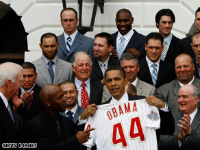 The 2008 World Series Champions posed for photos with Obama after presenting him with a personalized 'Obama 44' jersey.