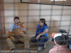Best Friends trainer John Garcia and Georgia, one of the dogs living at Best Friends Animal Sanctuary.