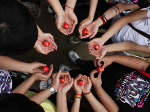 Mourners at Beichuan  Middle School hold a ceremony for children killed in the 2008 earthquake.