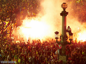 Barcelona fans celebrate in the streets of the Spanish city.