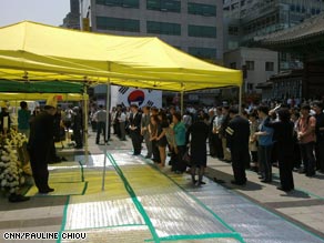 This makeshift altar is one of several set up in Seoul and across the country to mourn Roh.