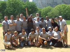 The American Morning staff softball players pose for a photo.