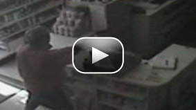 Surveillance video from Reliable Discount Pharmacy on May 19, 2009.