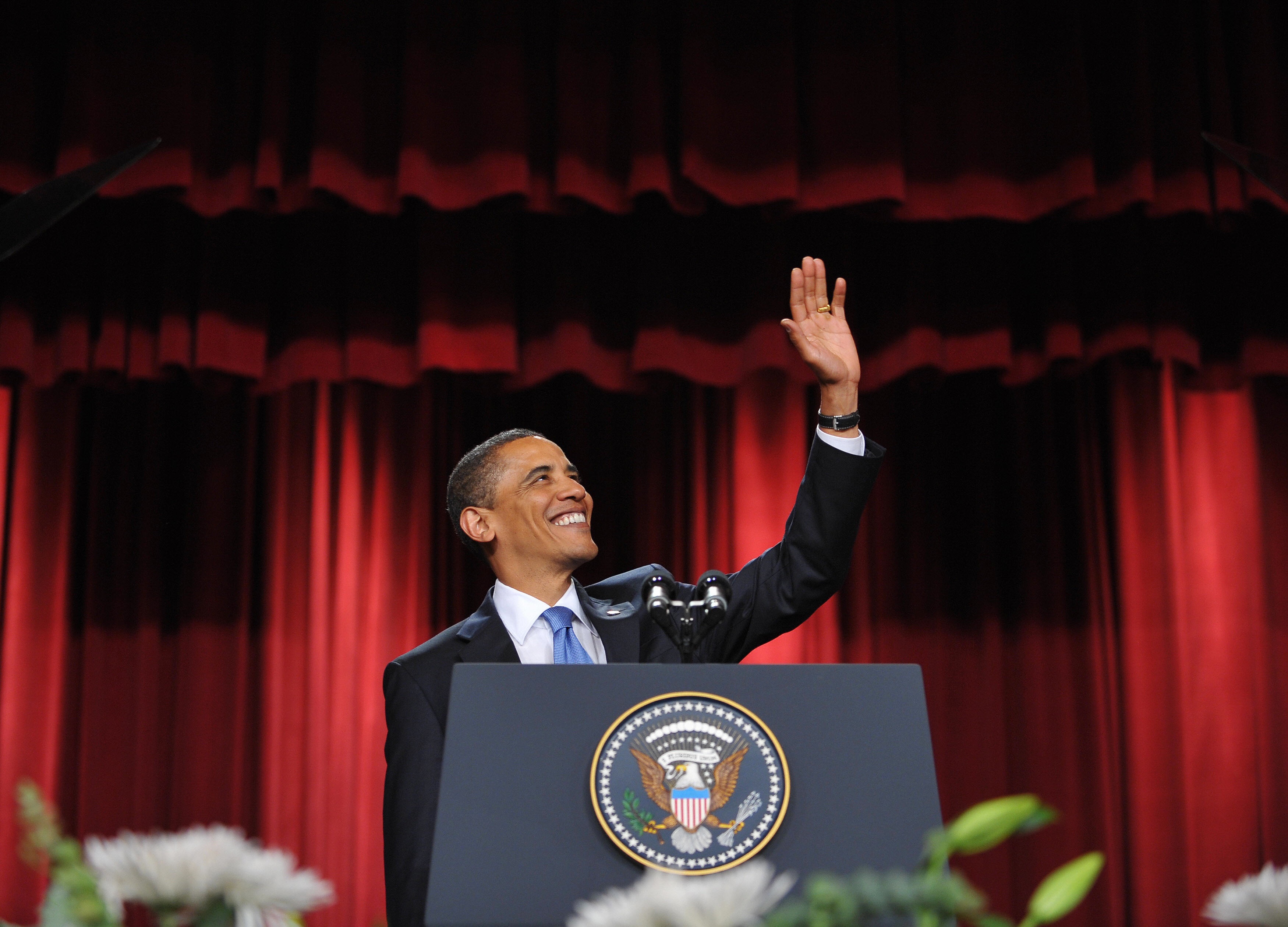 MANDEL NGAN/AFP/Getty Images. US President Barack Obama waves as he arrives onto the stage to deliver his highly-anticipated address to the Muslim world on June 4, 2009 in the Grand Hall of Cairo University in Cairo. Obama discussed Middle East peace with his Egyptian host ahead of a much-heralded address to the world's Muslims, seeking to heal a wide rift between America and Islam.