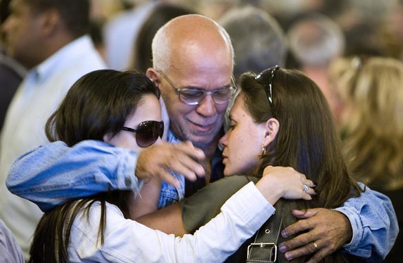 Friends and relatives of the Air France flight 447 passengers comfort each other after attending a mass in their homage at the Candelaria Cathedral on June 4, 2009 in Rio de Janeiro, Brazil. Getty Images