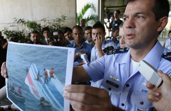 Brazilian Air Force officer Henry Nunhoz shows a picture during a press conference to announce the recovery of more bodies of the 228 victims of the of the Air France A330 aircraft lost in midflight over the Atlantic ocean June 1st, in Recife, Brazil on June 8, 2009. Getty Images