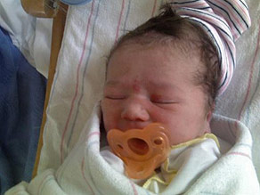 Baby Gwen: Look at that adorable little face!