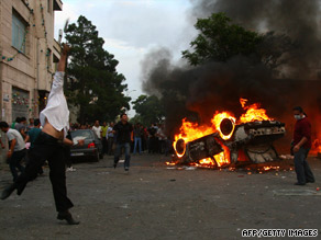 Supporters of Iranian opposition leader Mir Hossein Moussavi protest Monday in Tehran.