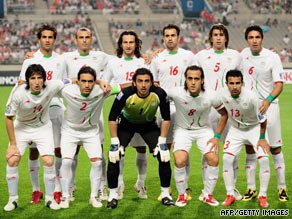 Members of Iran's National Soccer Team sport green bands in their game against South Korea on Wednesday.