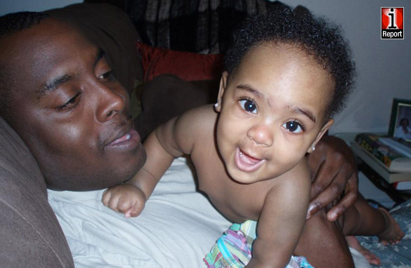 Sgt Warmsley and his baby Tiana.