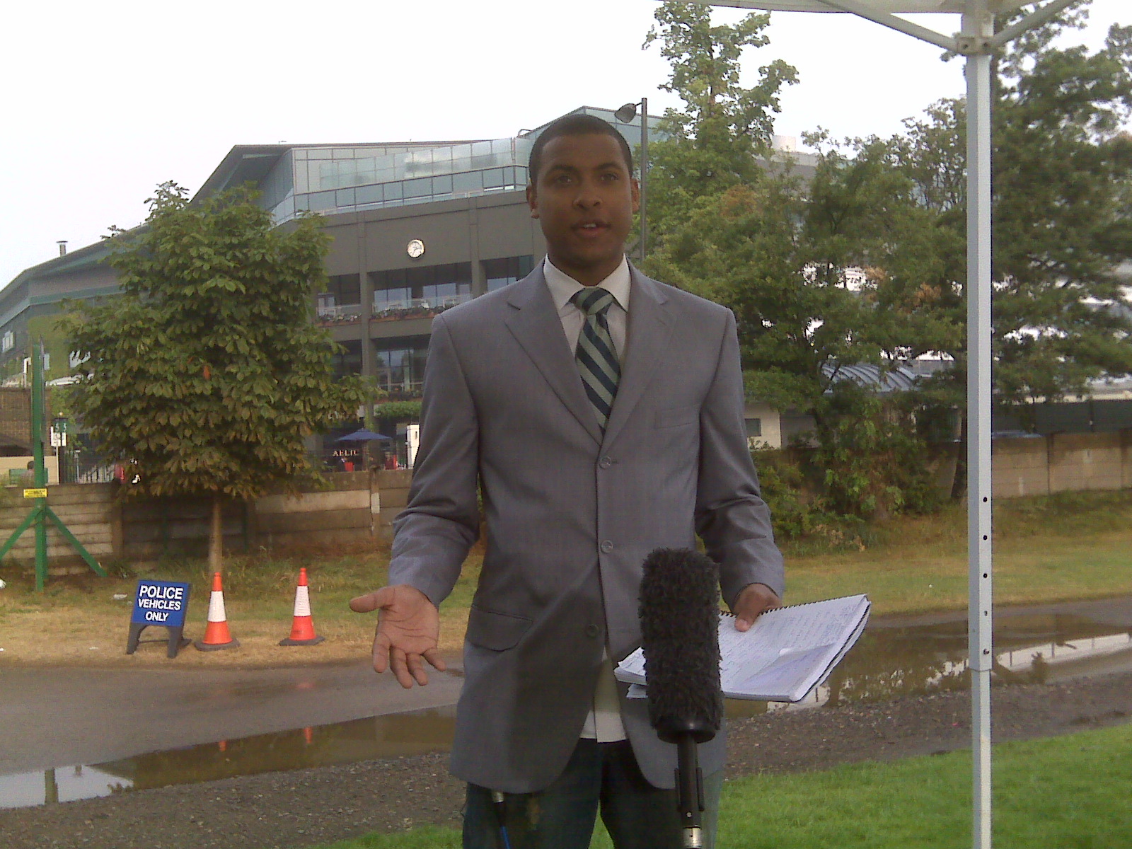 Errol Barnett soaks up the atmosphere -- and drizzle at Wimbledon.