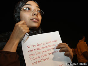 A protester at Cairo airport awaits the body of Marwa El-Sherbini, who was killed in Germany.