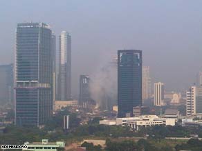 One witness captured the smoke rising above downtown Jakarta from the Ritz Carlton being bombed.