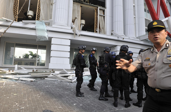 Indonesian counter-terrorist police commandos secure the damaged Ritz-Carlton hotel in Jakarta on July 17, 2009 after an explosion hit the Ritz-Carlton and nearby JW Marriot hotel. (Getty Images)