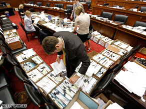 Boxes of amendments sit in the chamber where the House Energy and Committee meets.