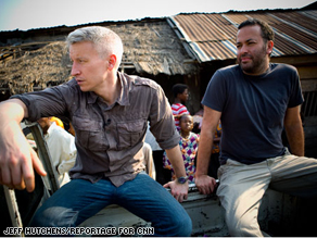 Anderson and virus hunter Dr. Nathan Wolfe in Cameroon.