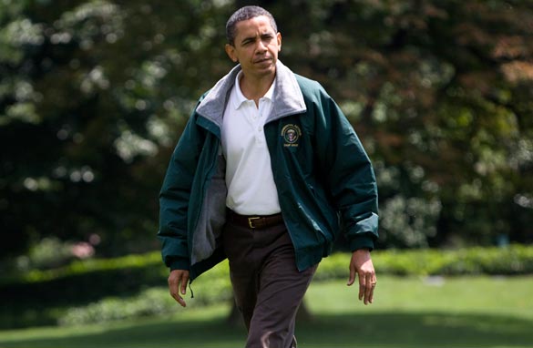 President Barack Obama walks from Marine One upon his return on the South Lawn of the White House August 1, 2009 in Washington, DC. (Getty Images)