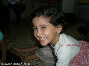 Neba Fahed, 4, laughs when company comes to visit her family in Jordan.