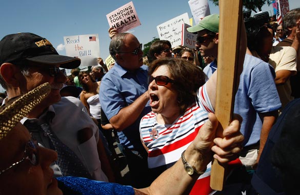 Several hundred people, both for and against health care reform, gathered to demonstrate on August 8, 2009 in Brighton, Colorado. (Photo by John Moore/Getty Images)